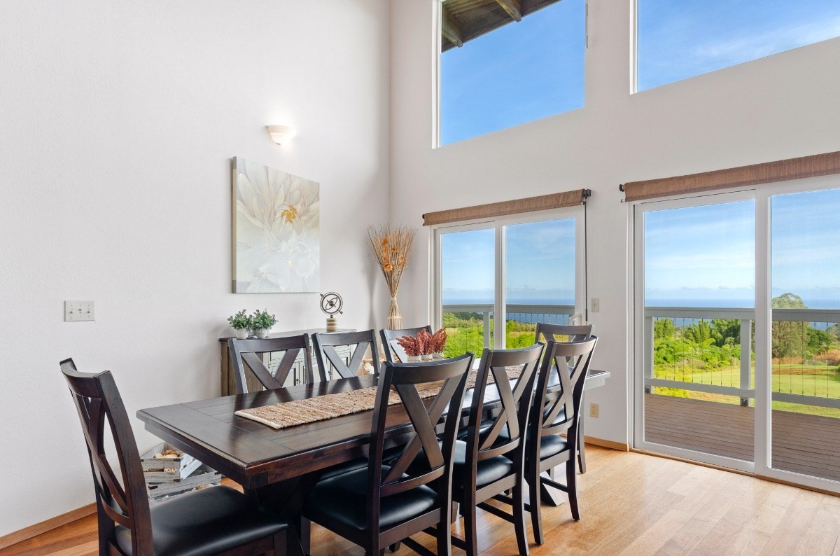 2100 Kaiwiki Road Hilo, HI 96720 - Photo 10 of 29 a dining room with furniture and a floor to ceiling window