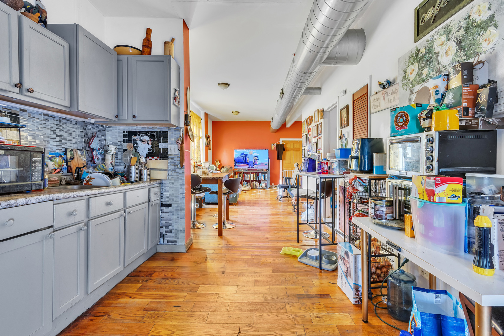 4217 West Division Street Chicago, IL 60651 - Photo 8 of 15 a kitchen with lots of white appliances and cabinets