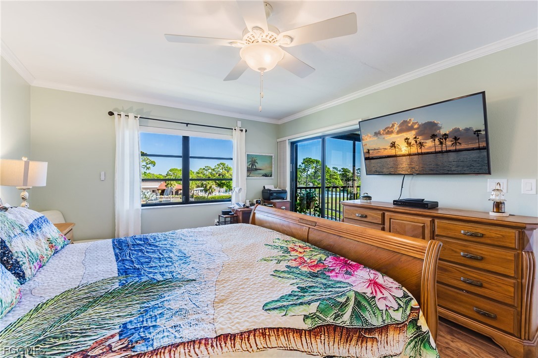 23465 Harbor View Road, Unit 734 Punta Gorda, FL 33980 - Photo 19 of 40 a living room with furniture and a flat screen tv