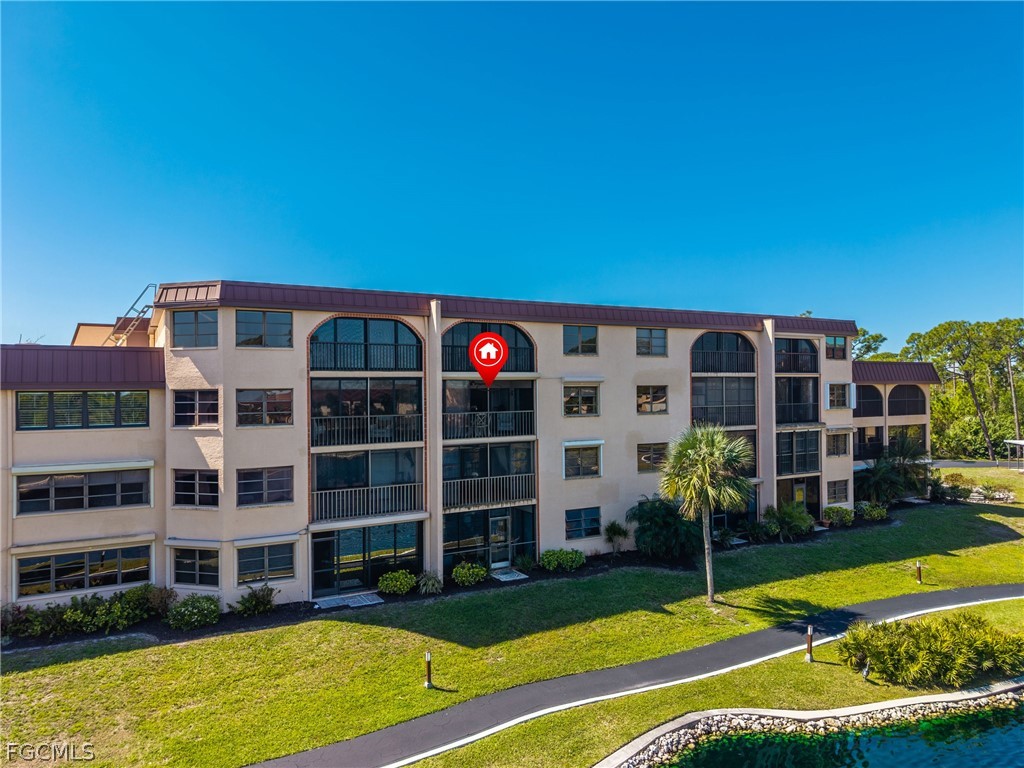 23465 Harbor View Road, Unit 734 Punta Gorda, FL 33980 - Photo 27 of 40 a view of pool with outdoor seating