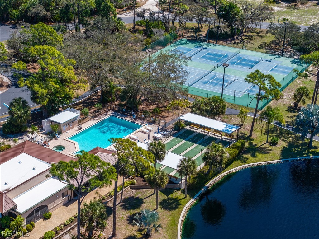 23465 Harbor View Road, Unit 734 Punta Gorda, FL 33980 - Photo 34 of 40 an aerial view of a house with a yard basket ball court and outdoor seating
