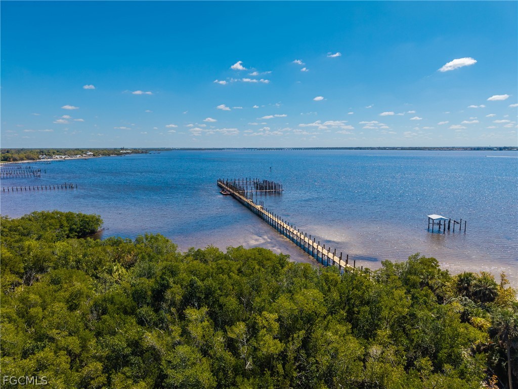 23465 Harbor View Road, Unit 734 Punta Gorda, FL 33980 - Photo 39 of 40 a view of a pathway with a building in background