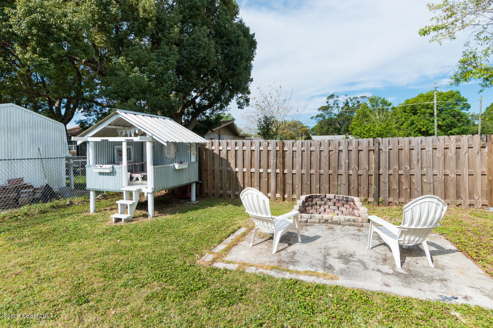 125 Monaco Road West Melbourne, FL 32904 - Photo 16 of 18 Fire Pit & Shabby Chic Playhouse