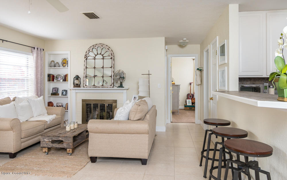 125 Monaco Road West Melbourne, FL 32904 - Photo 4 of 18 Living Area to Kitchen