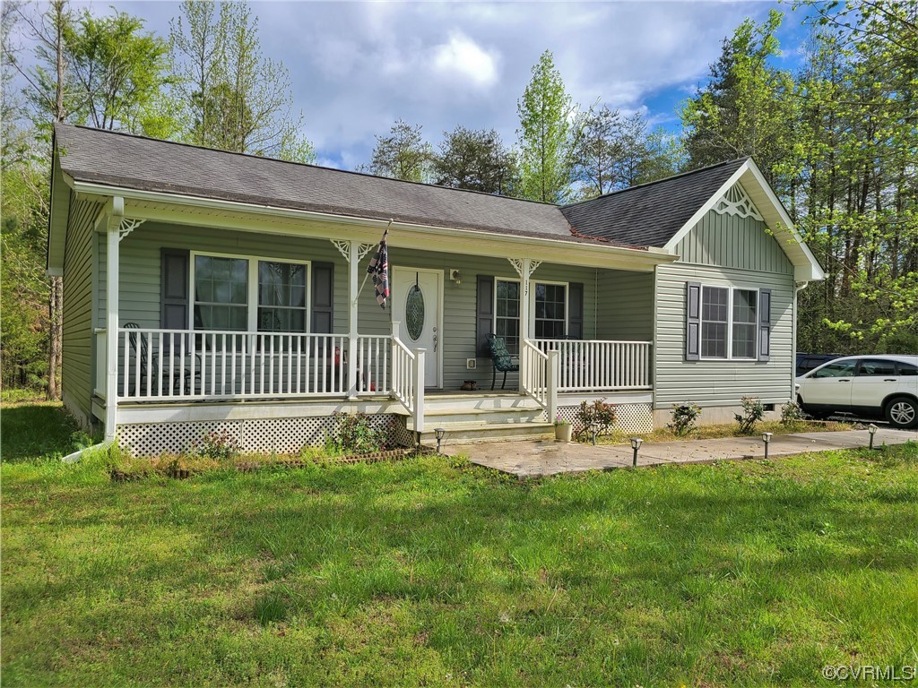 1174 Plank Road Farmville, VA 23901 - Photo 1 of 21 a front view of house with yard and outdoor seating