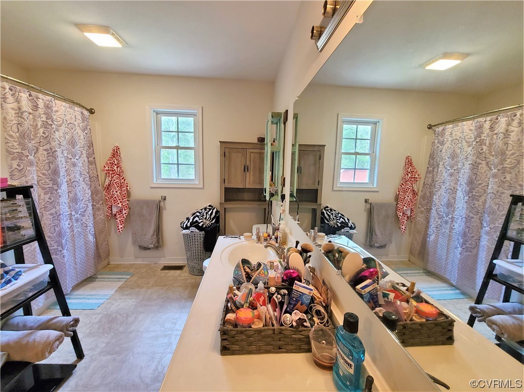 1174 Plank Road Farmville, VA 23901 - Photo 15 of 21 a bed room with furniture and a window