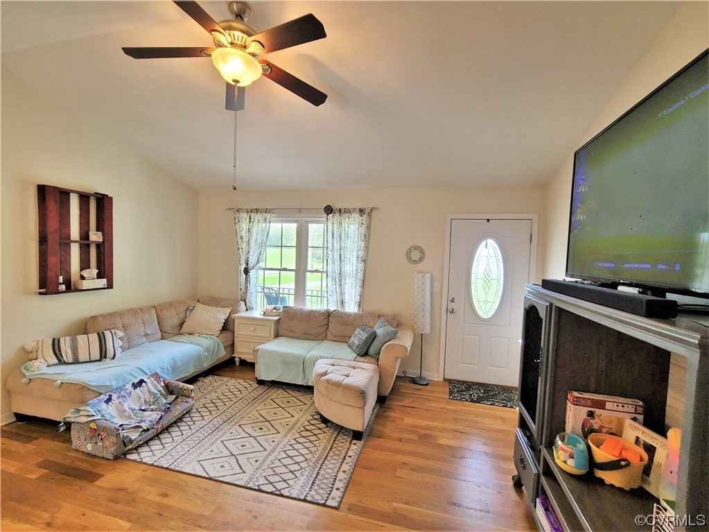 1174 Plank Road Farmville, VA 23901 - Photo 8 of 21 a living room with furniture and a flat screen tv