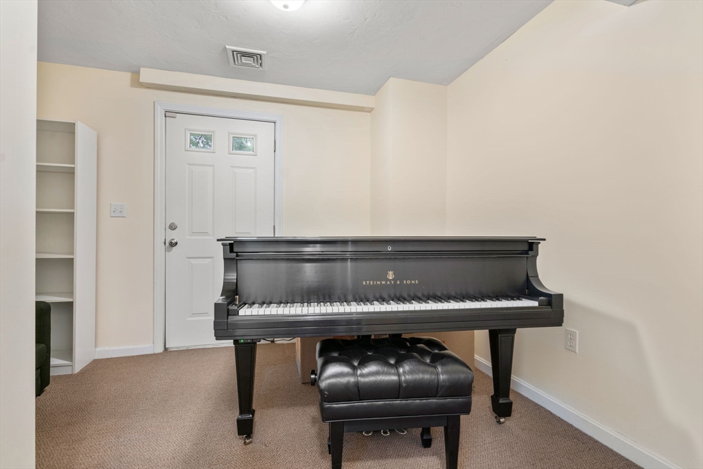 995 Trapelo Road, Unit 1 Waltham, MA 02452 - Photo 14 of 19 a utility room with a sink