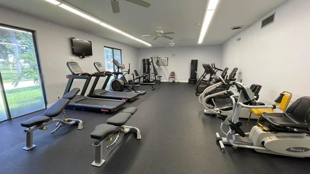 a view of a room with gym equipment