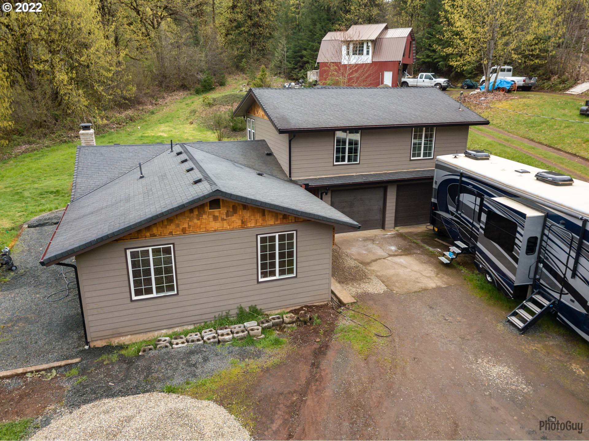 87533 Cedar Flat Road Springfield, OR 97478 - Photo 1 of 32 a view of a house with a patio