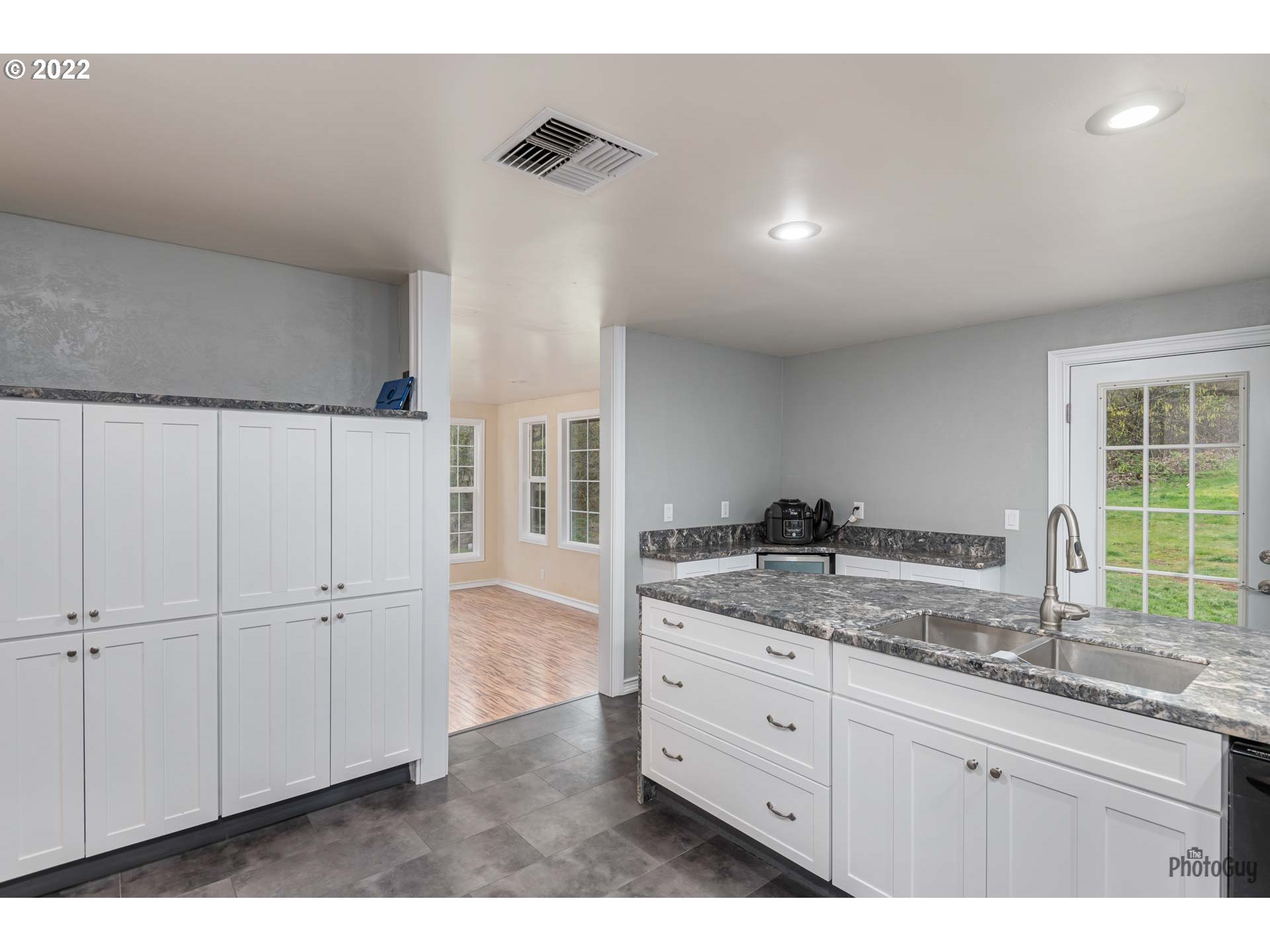 87533 Cedar Flat Road Springfield, OR 97478 - Photo 11 of 32 a kitchen with a sink and cabinets