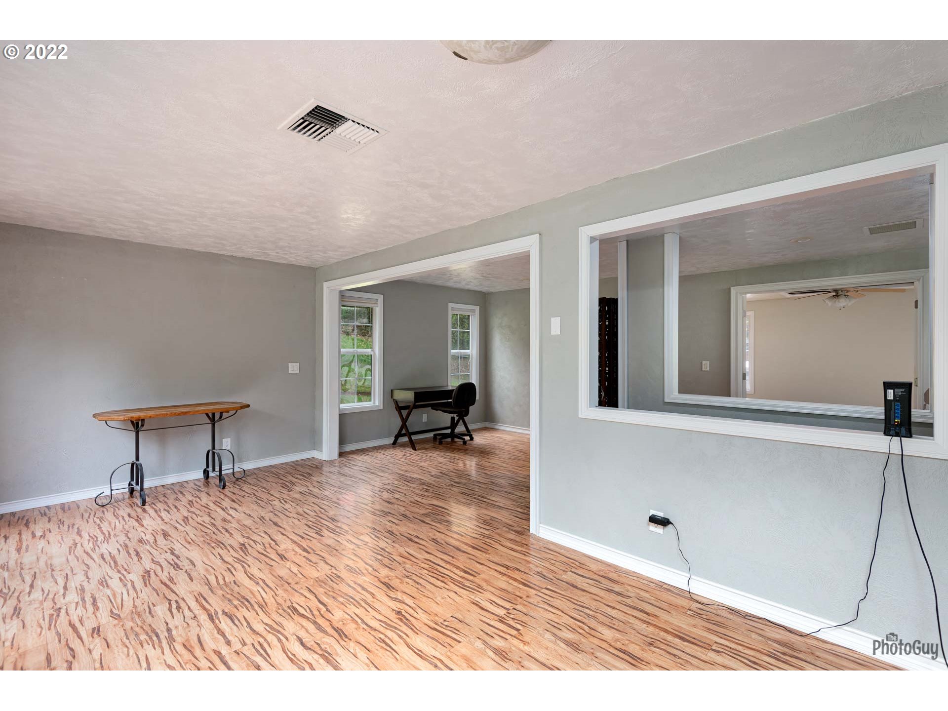 87533 Cedar Flat Road Springfield, OR 97478 - Photo 19 of 32 a view of a livingroom with wooden floor and furniture