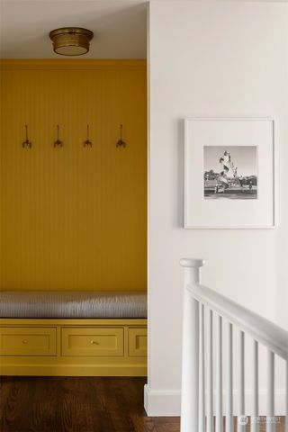 a view of a room with bed and a window