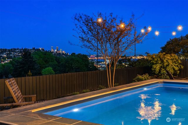 a view of a chair and tables in the patio
