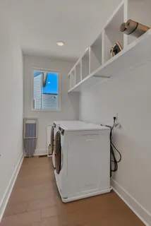 a view of a room with rack on the wall