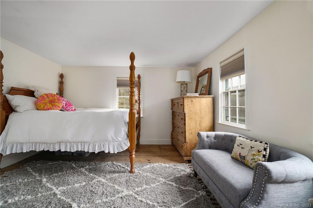 2 Deforest Road Wilton, CT 06897 - Photo 23 of 37 a bedroom with a bed and window