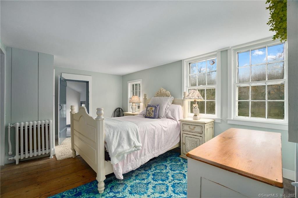 2 Deforest Road Wilton, CT 06897 - Photo 26 of 37 a bed room with a bed and a window