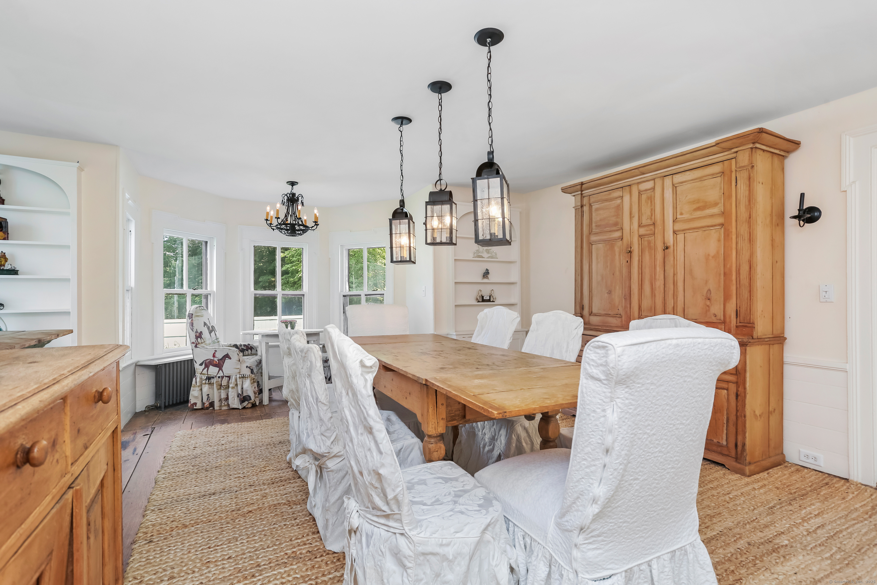 2 Deforest Road Wilton, CT 06897 - Photo 4 of 37 a view of a dining room with furniture window and wooden floor