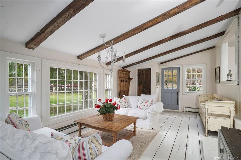 2 Deforest Road Wilton, CT 06897 - Photo 10 of 37 a view of a dining room with furniture window and wooden floor