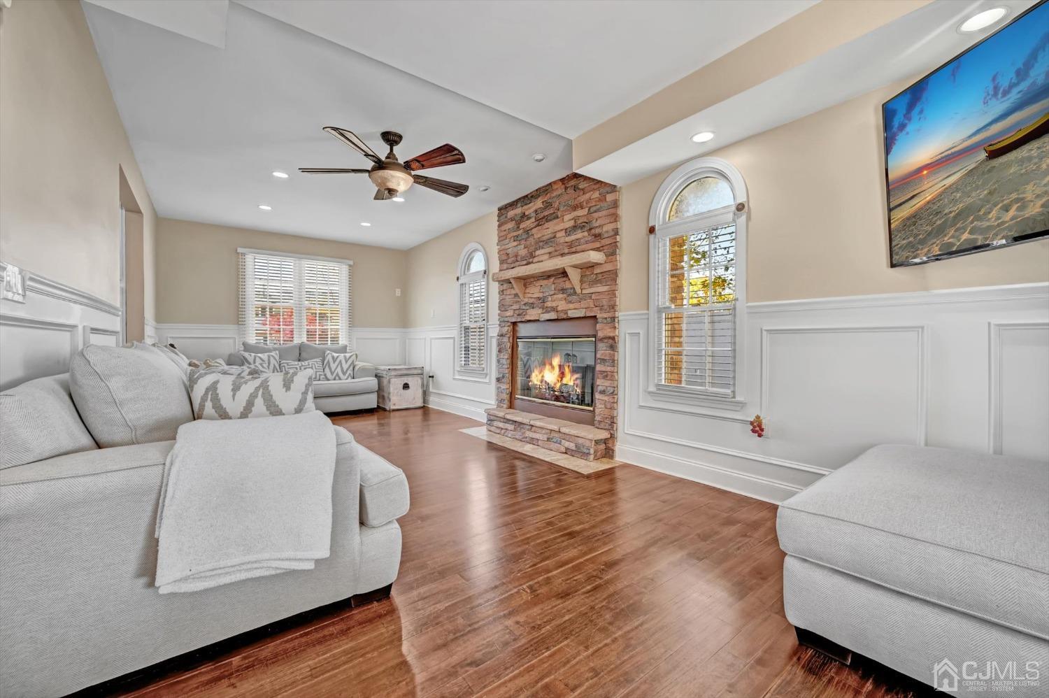 40 Grace Drive Old Bridge, NJ 08857 - Photo 12 of 41 a living room with fireplace furniture and a wooden floor