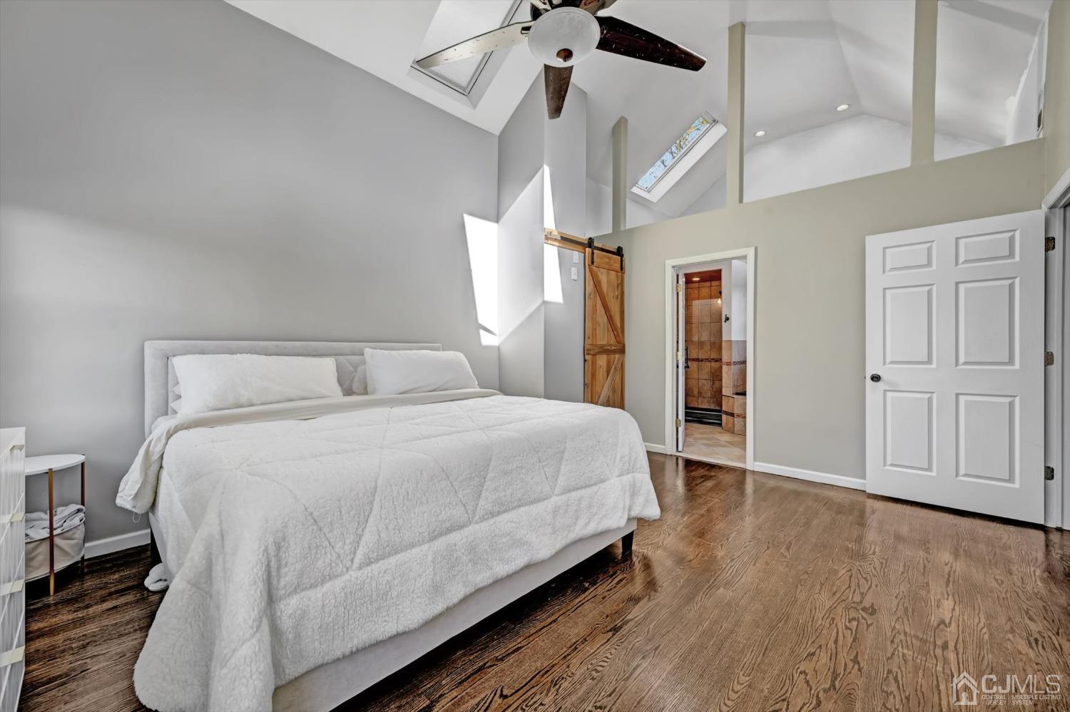 40 Grace Drive Old Bridge, NJ 08857 - Photo 22 of 41 a bedroom with a large bed and wooden floor