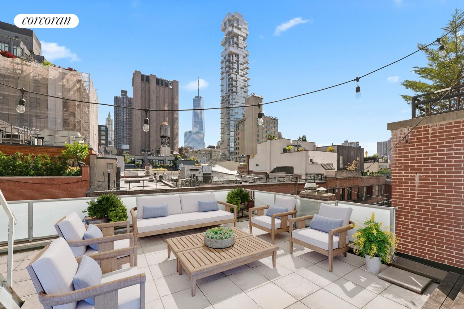 a view of balcony with seating space and plants