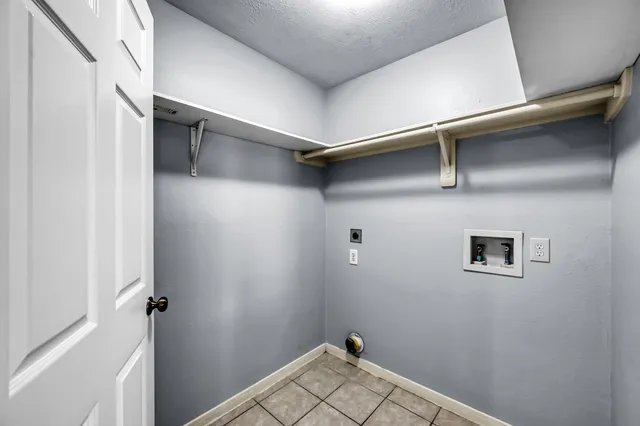 a view of small space with racks on the wall