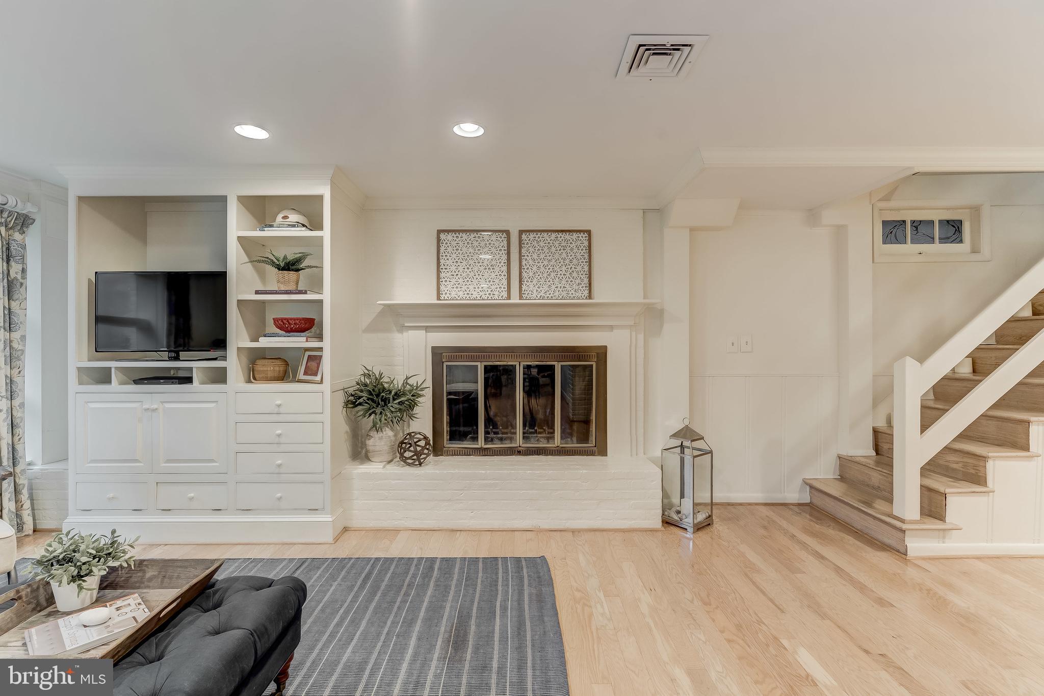 126 Round Bay Road Severna Park, MD 21146 - Photo 13 of 80 Wood-burning fireplace with white brick surround