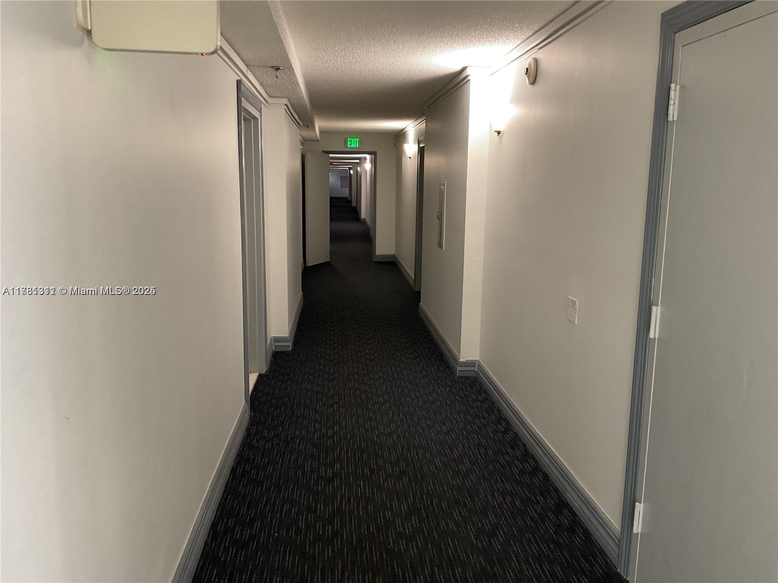 17011 North Bay Road, Unit 701 Sunny Isles Beach, FL 33160 - Photo 17 of 41 a view of a hallway