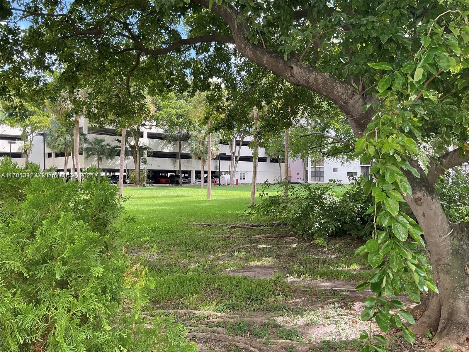 17011 North Bay Road, Unit 701 Sunny Isles Beach, FL 33160 - Photo 36 of 41 a view of a house with a backyard