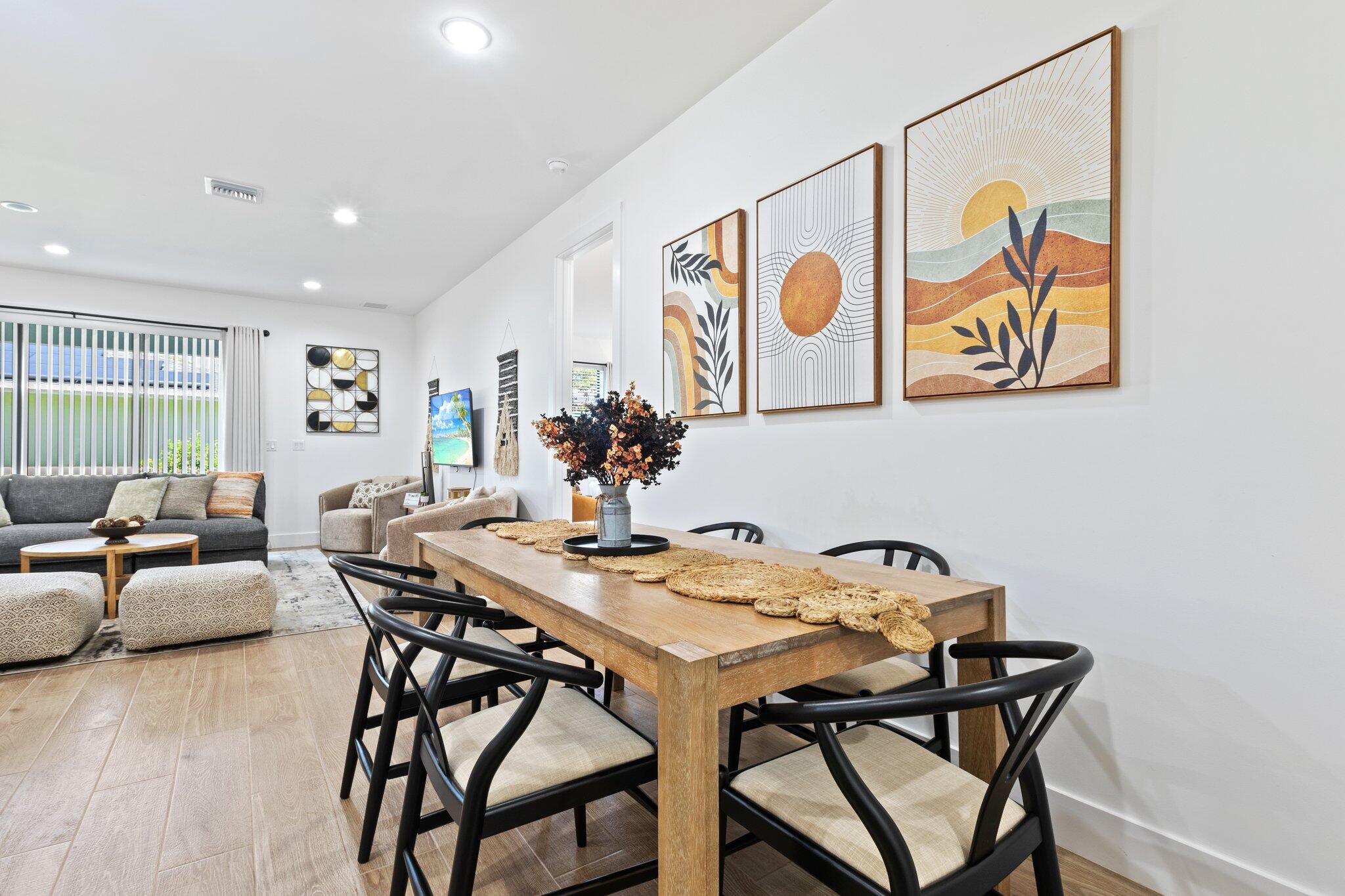 601 Southwest 3rd Street Delray Beach, FL 33444 - Photo 13 of 75 a view of a dining room with furniture and wooden floor