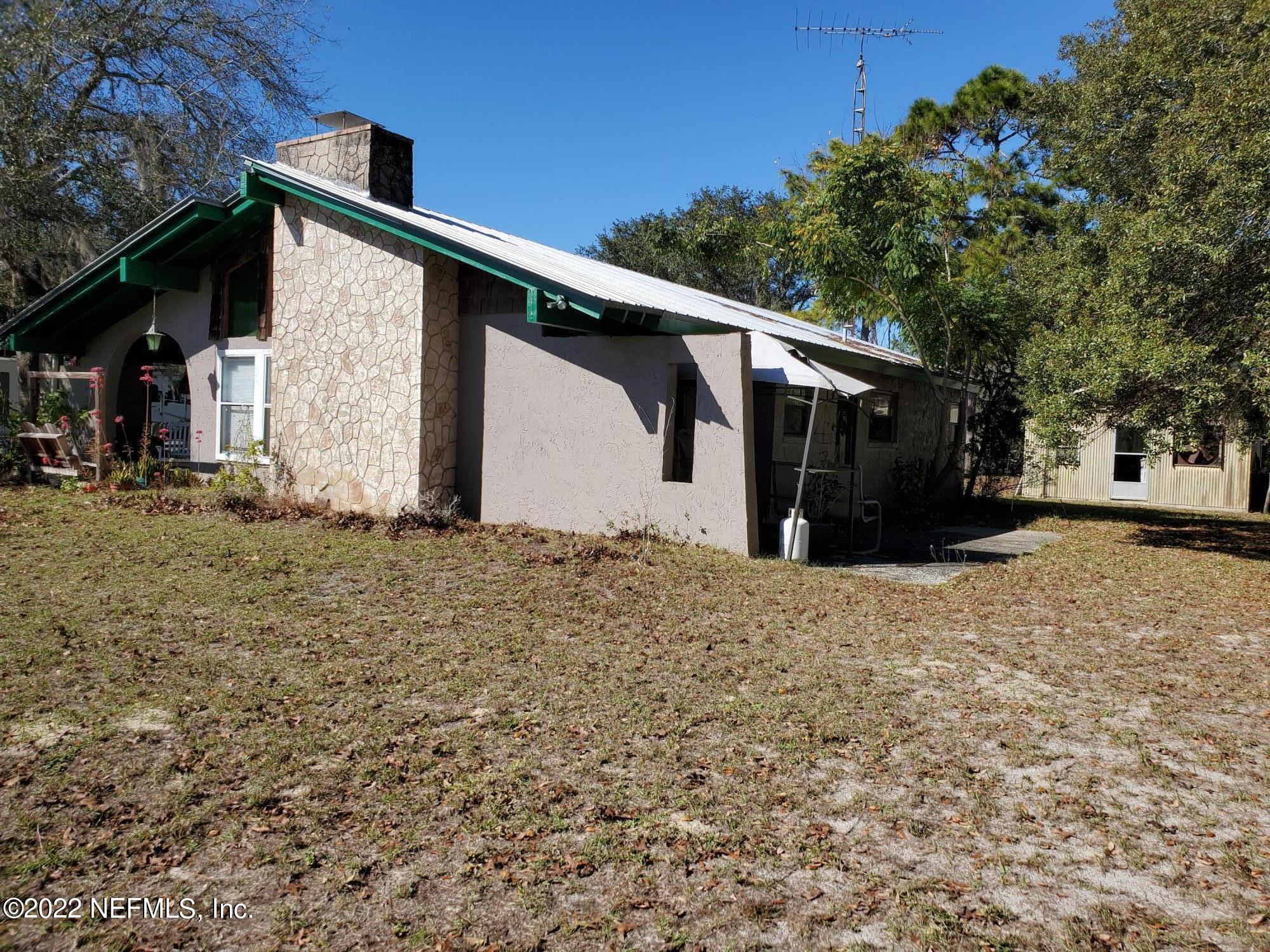 106 Comer Road Palatka, FL 32177 - Photo 2 of 19 a view of a house with a yard