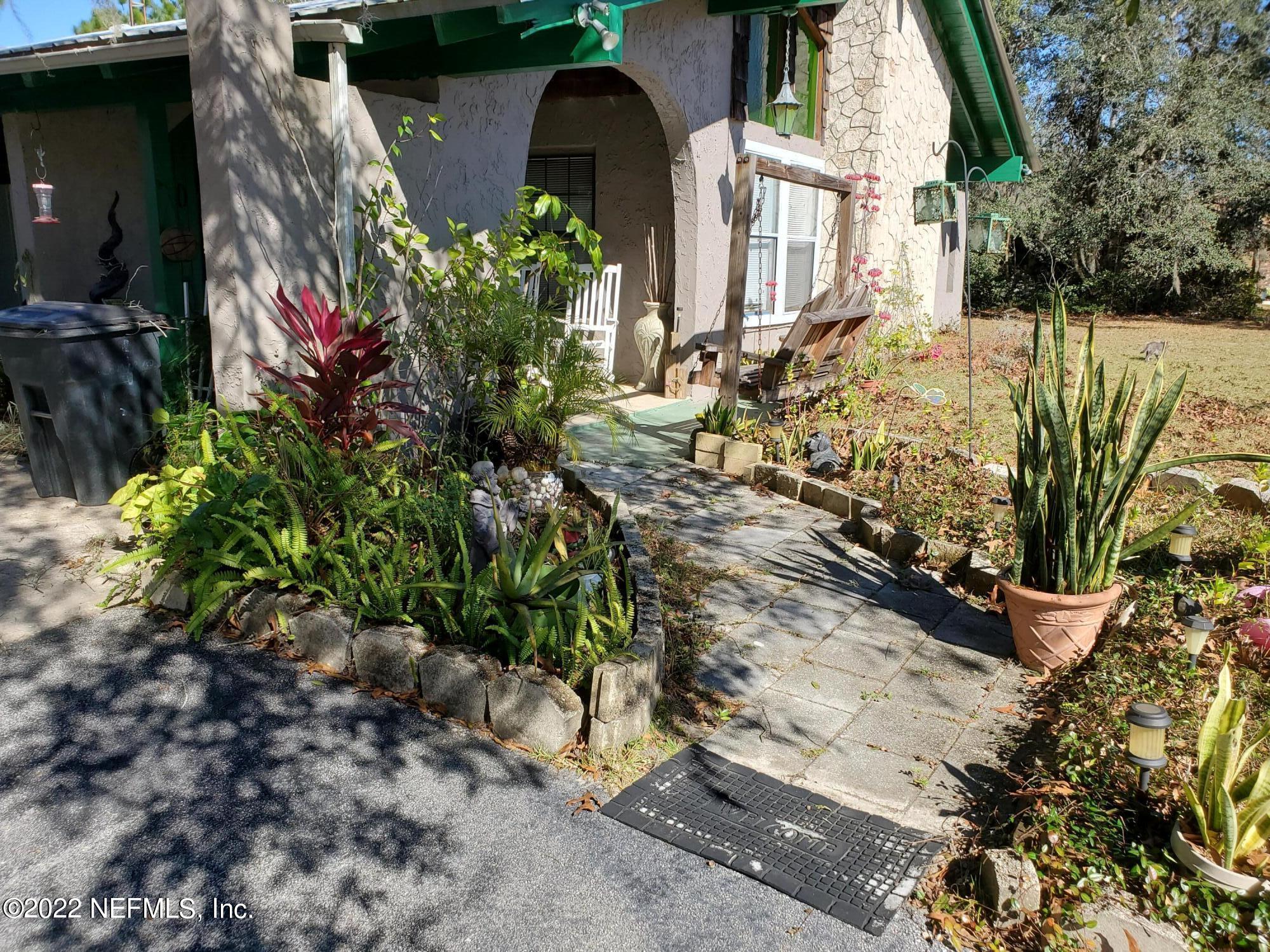 106 Comer Road Palatka, FL 32177 - Photo 5 of 19 a backyard of a house with lots of green space