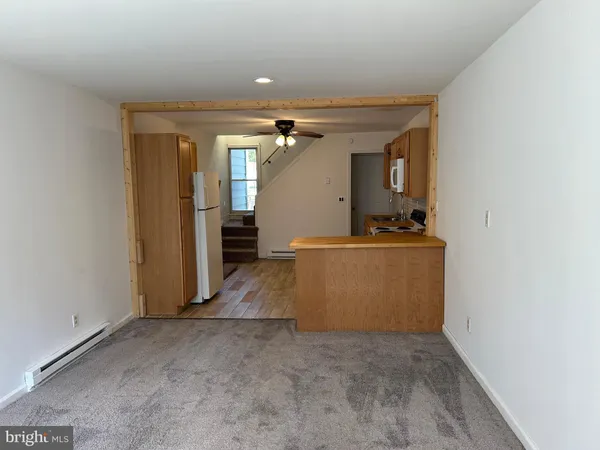 a view of a kitchen with a sink
