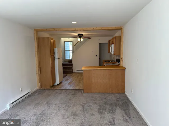 a view of a kitchen with a sink