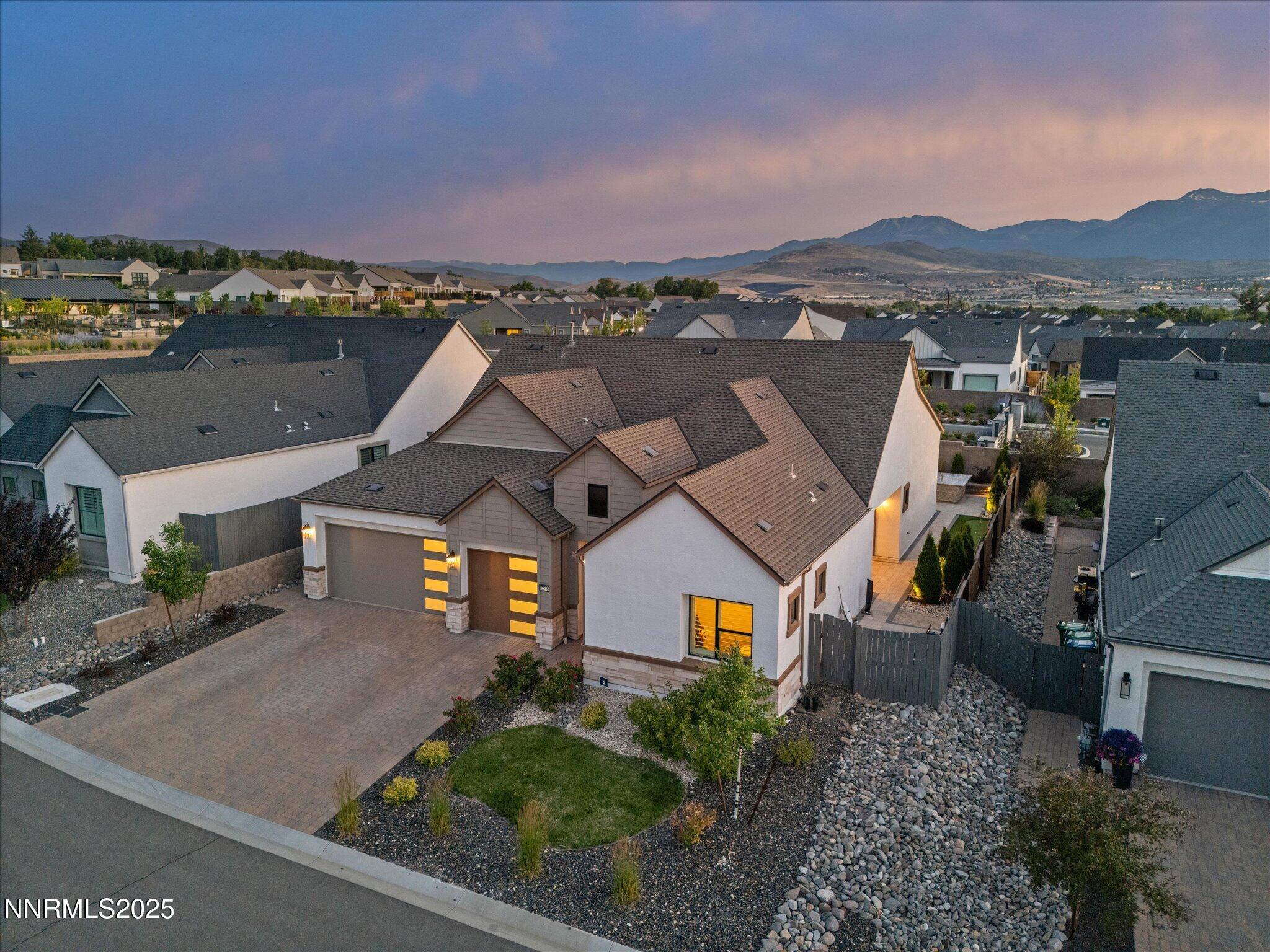 13545 Cobalt Sky Street Reno, NV 89521 - Photo 15 of 96 an aerial view of a house with a mountain