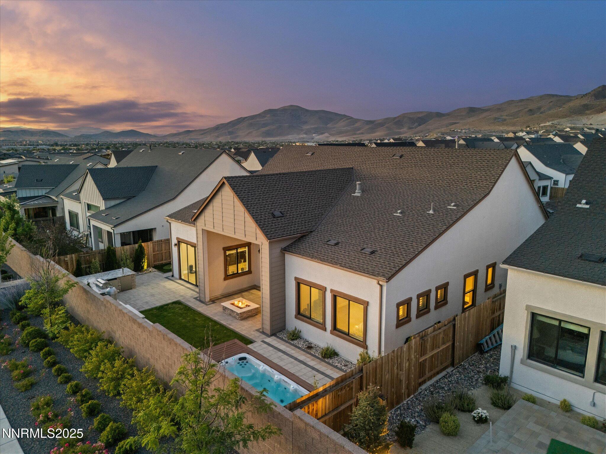 13545 Cobalt Sky Street Reno, NV 89521 - Photo 17 of 96 a front view of a house with a yard