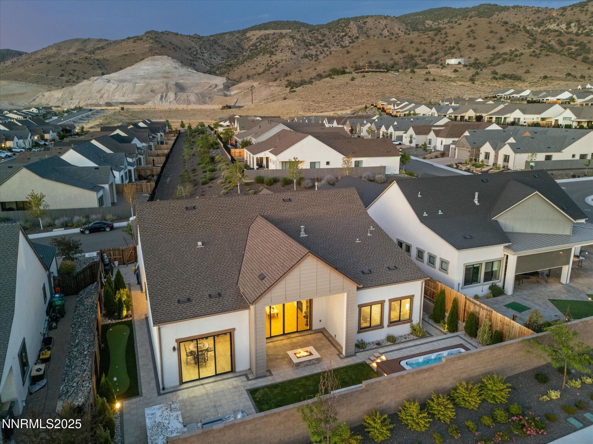 13545 Cobalt Sky Street Reno, NV 89521 - Photo 18 of 96 an aerial view of residential houses with outdoor space