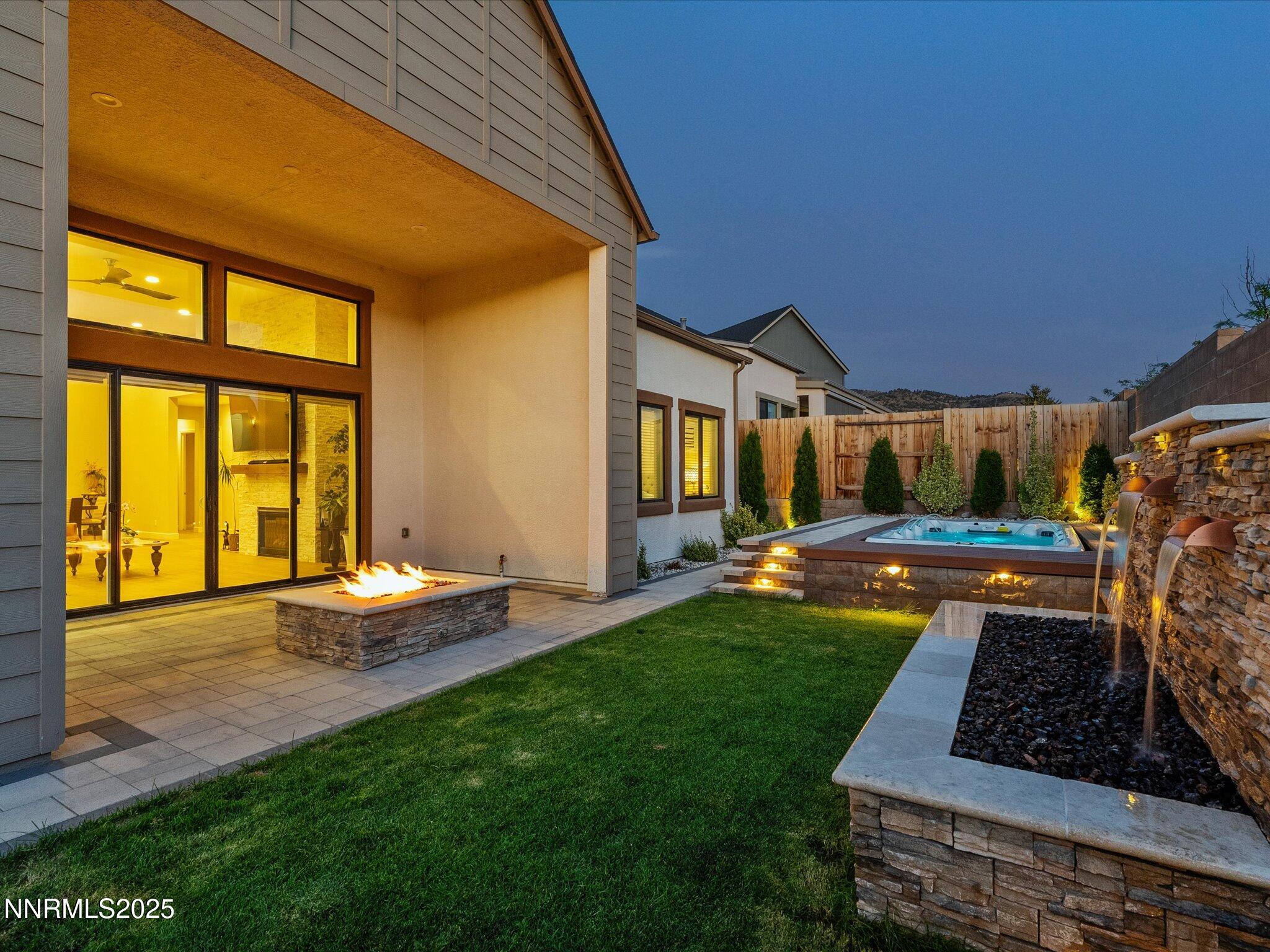 13545 Cobalt Sky Street Reno, NV 89521 - Photo 2 of 96 a view of a house with backyard and sitting area