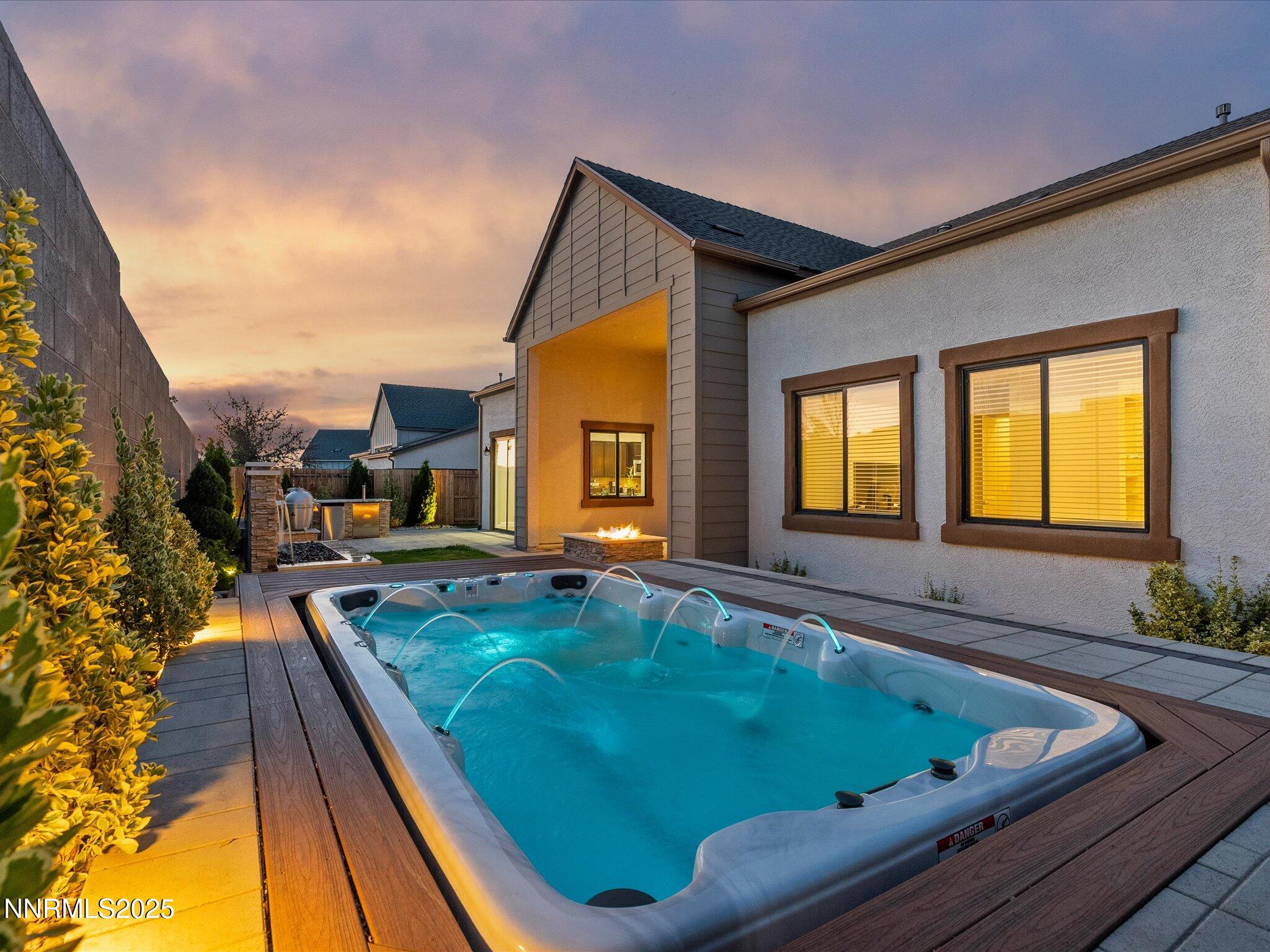 13545 Cobalt Sky Street Reno, NV 89521 - Photo 4 of 96 a view of swimming pool with seating area