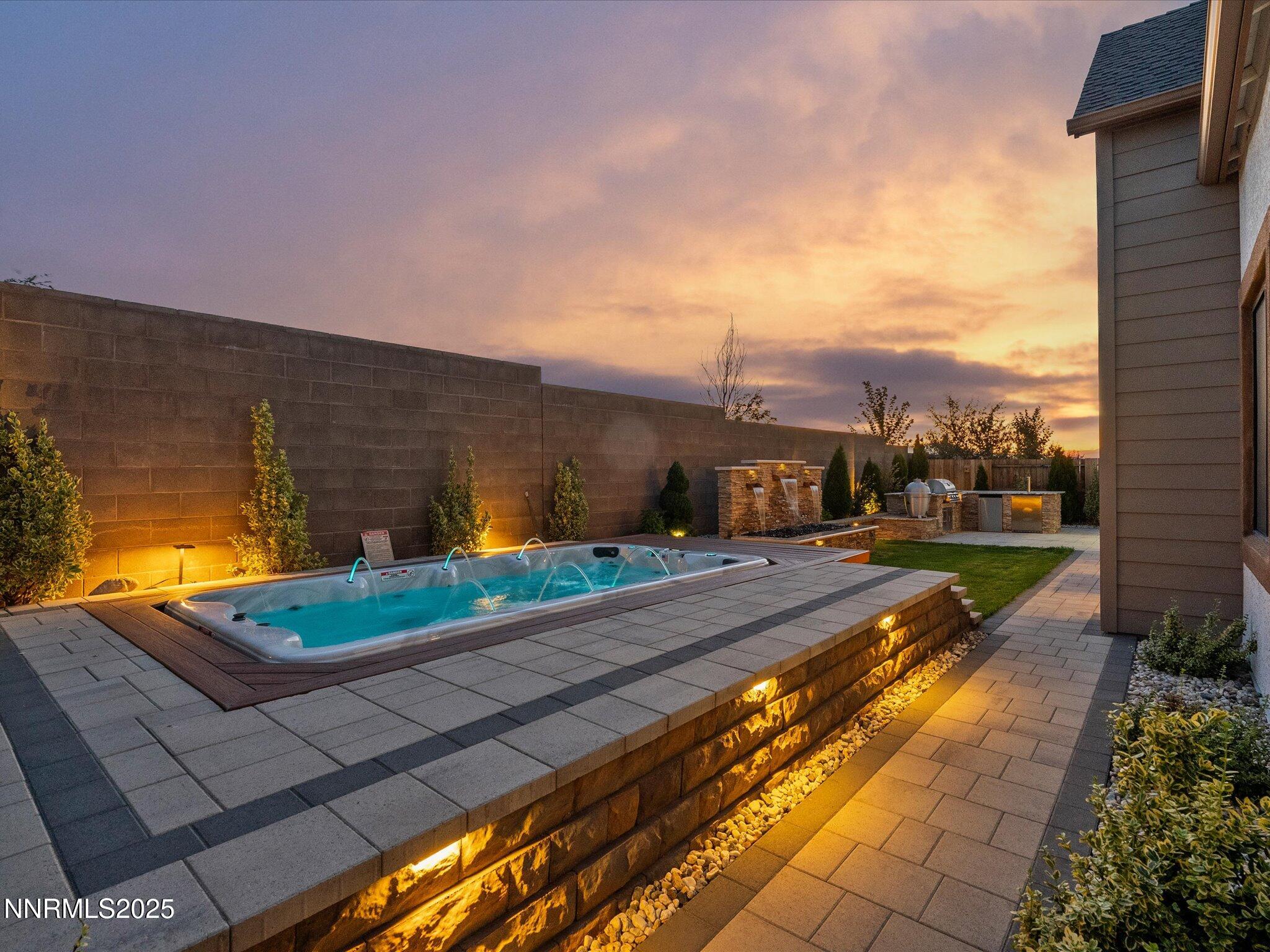 13545 Cobalt Sky Street Reno, NV 89521 - Photo 5 of 96 a view of a street with a building in the background