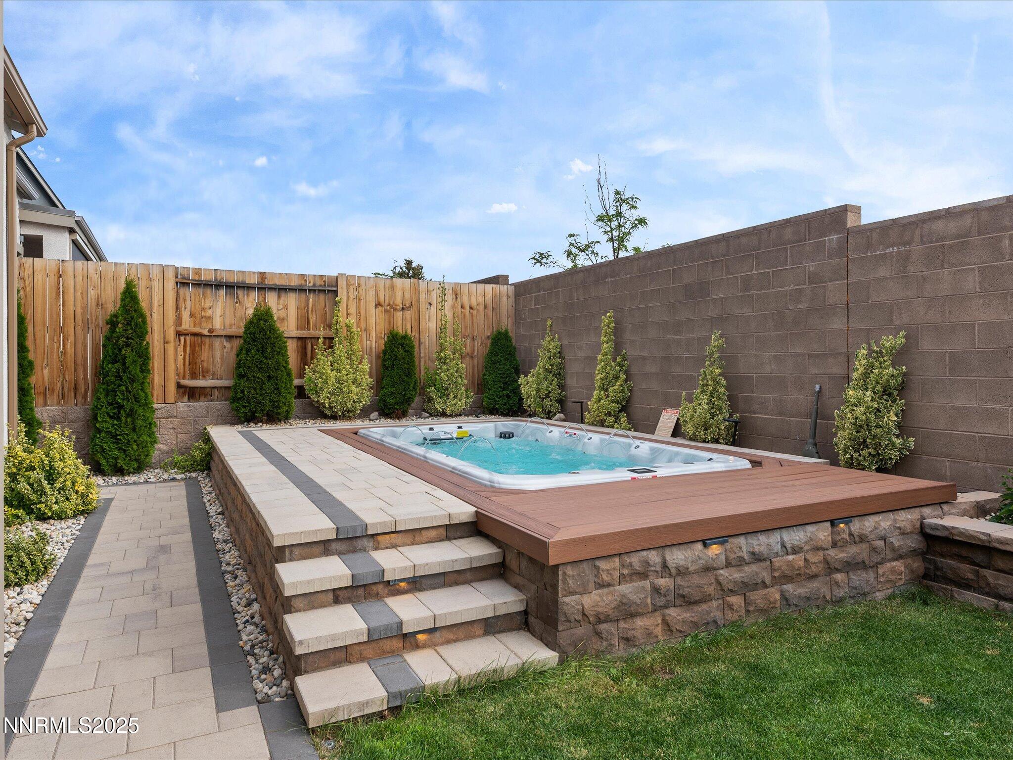 13545 Cobalt Sky Street Reno, NV 89521 - Photo 67 of 96 a view of a backyard with sitting area