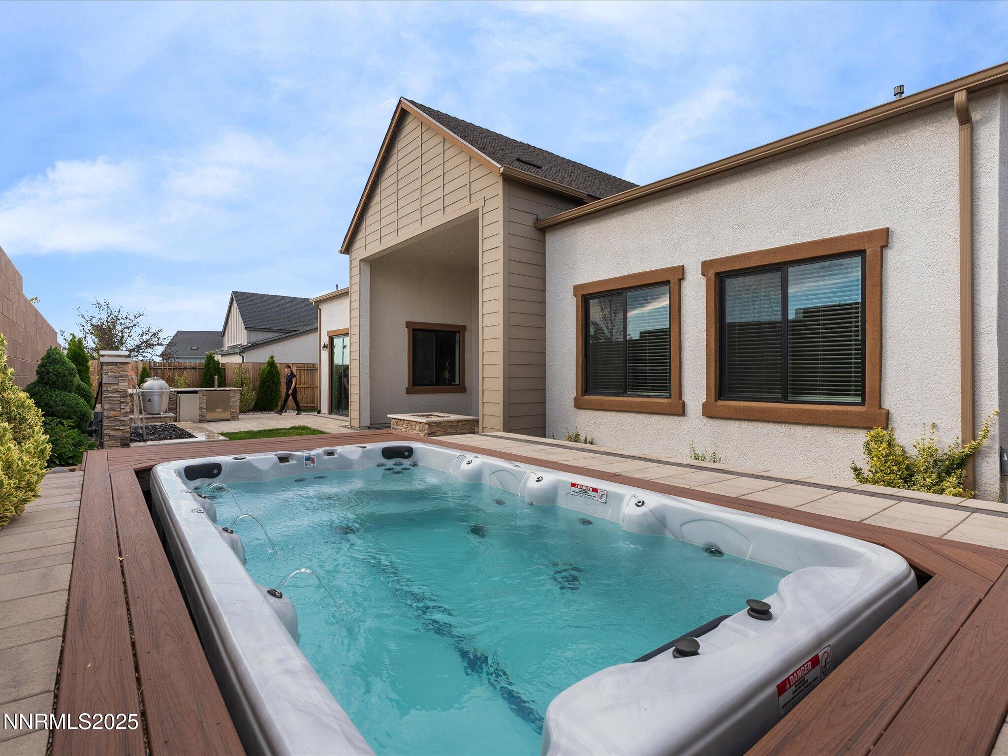 13545 Cobalt Sky Street Reno, NV 89521 - Photo 69 of 96 a view of a house with backyard and sitting area