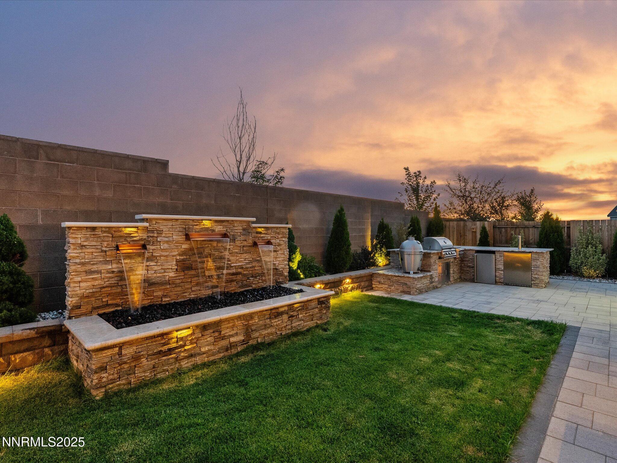 13545 Cobalt Sky Street Reno, NV 89521 - Photo 7 of 96 a view of a swimming pool with a bench and lawn chairs