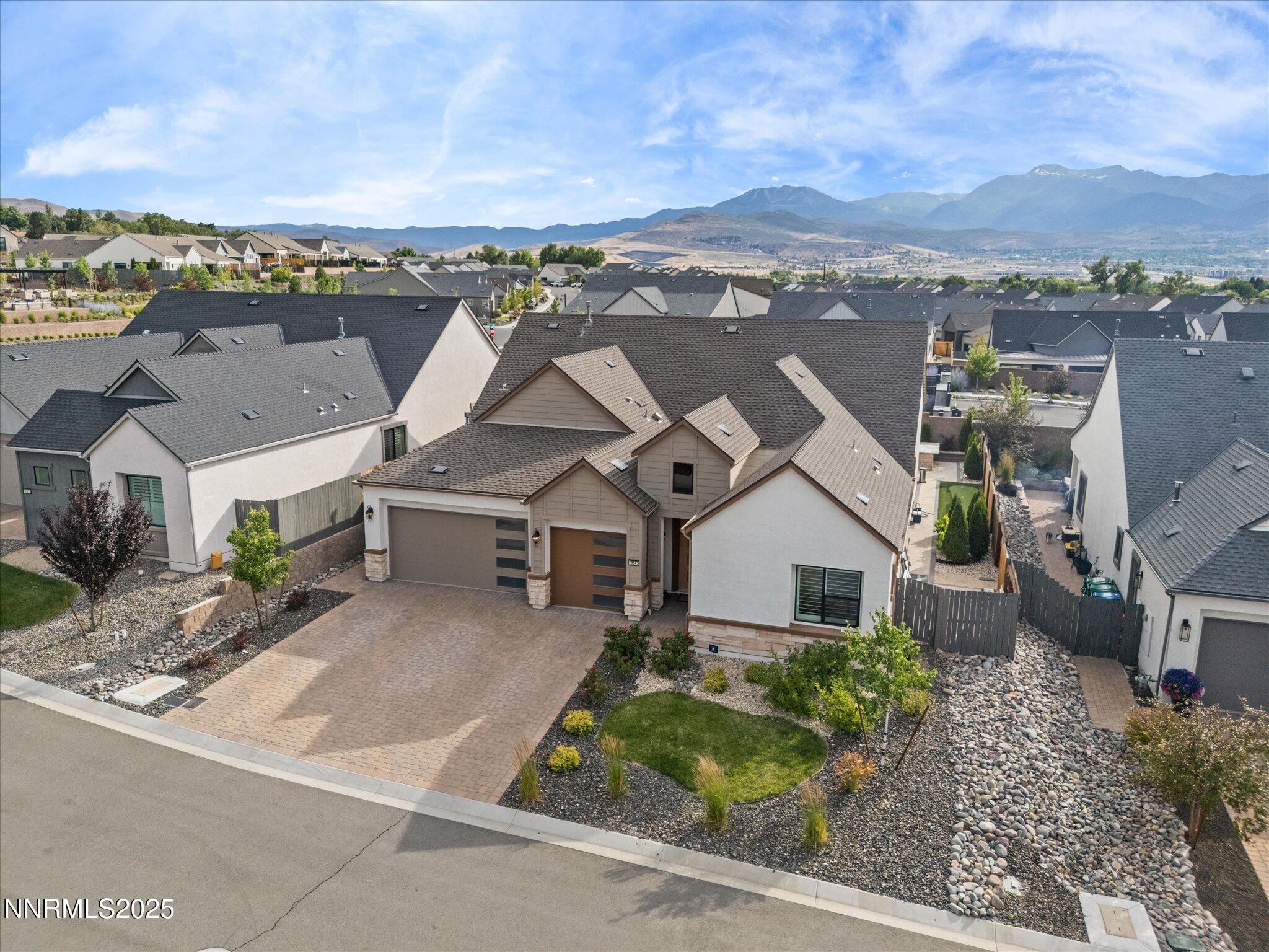13545 Cobalt Sky Street Reno, NV 89521 - Photo 77 of 96 an aerial view of a house with a yard