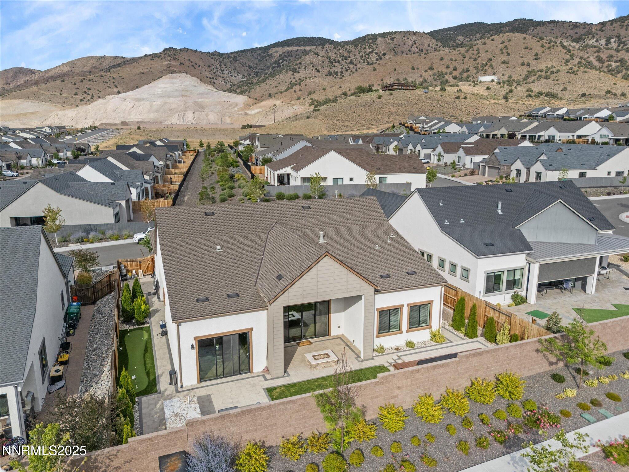 13545 Cobalt Sky Street Reno, NV 89521 - Photo 78 of 96 an aerial view of a house with a mountain