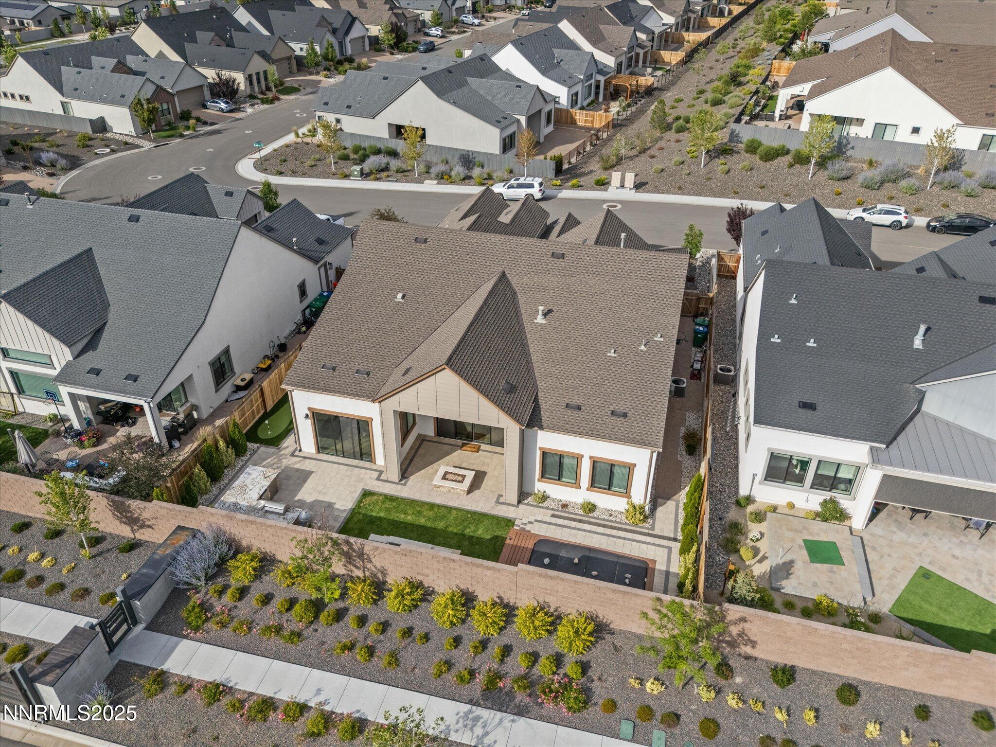 13545 Cobalt Sky Street Reno, NV 89521 - Photo 83 of 96 an aerial view of a house with large windows