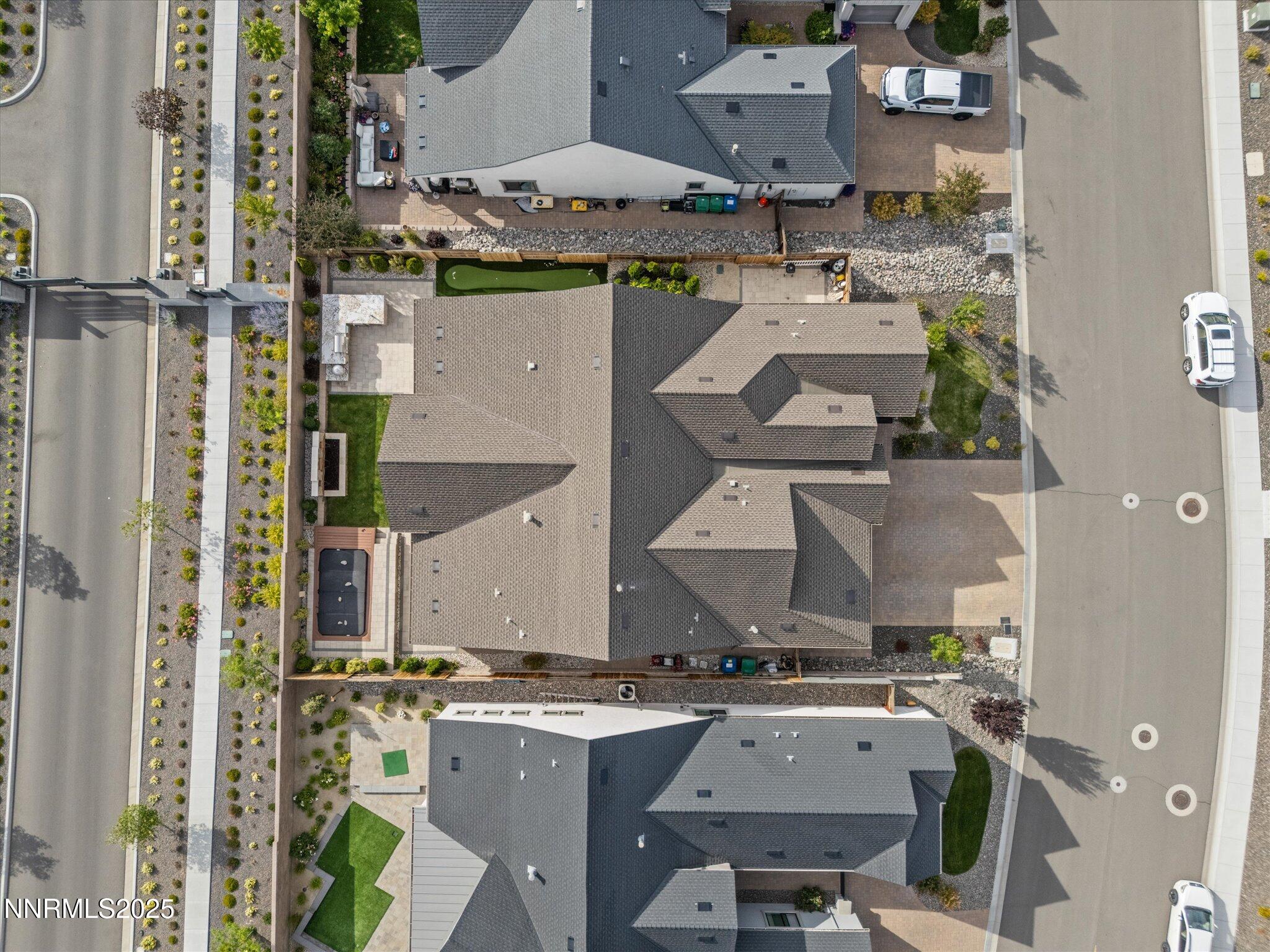 13545 Cobalt Sky Street Reno, NV 89521 - Photo 84 of 96 an aerial view of residential houses with outdoor space