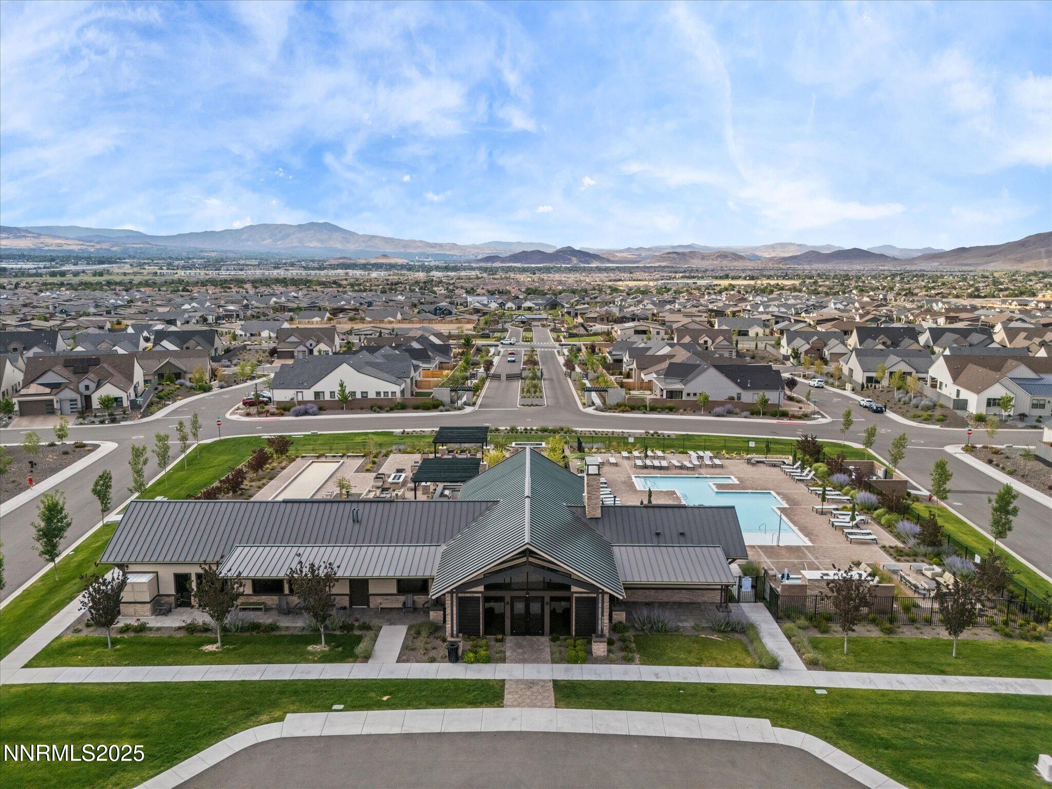 13545 Cobalt Sky Street Reno, NV 89521 - Photo 91 of 96 an aerial view of residential houses with outdoor space and ocean view