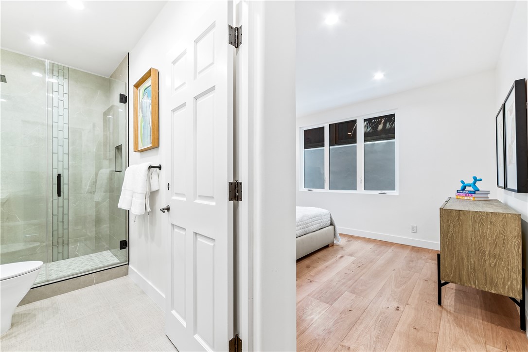 541 4th Street Manhattan Beach, CA 90266 - Photo 15 of 45 a spacious bathroom with a tub and shower